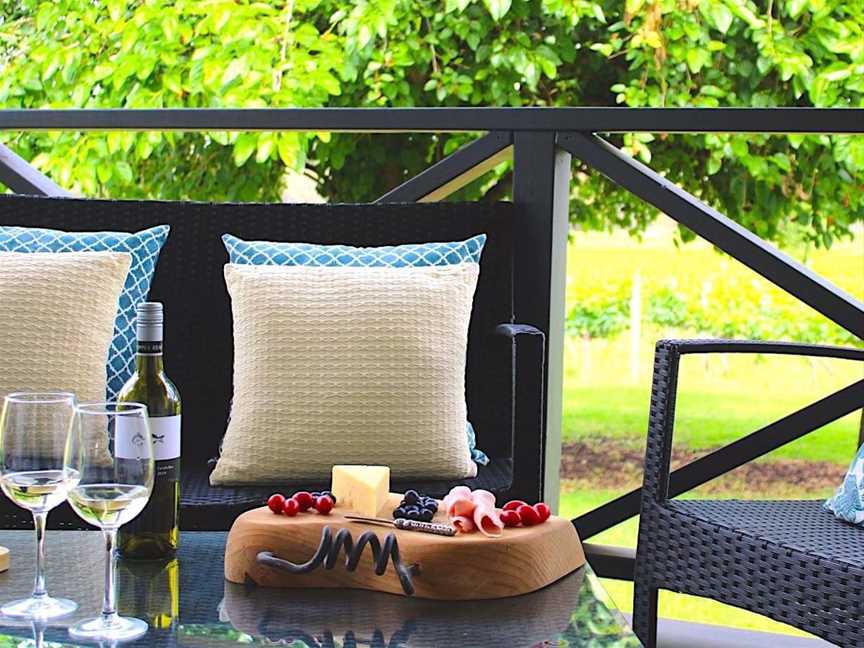 Relax on the deck with a glass or two of wine