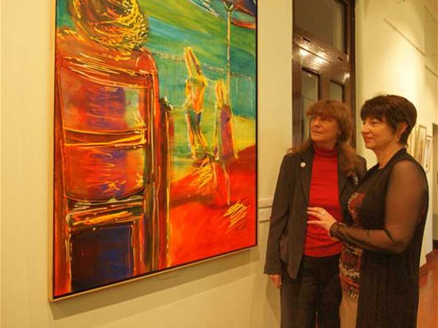 Artist Alba Cinquini and her artwork, with Councillor Gregorini