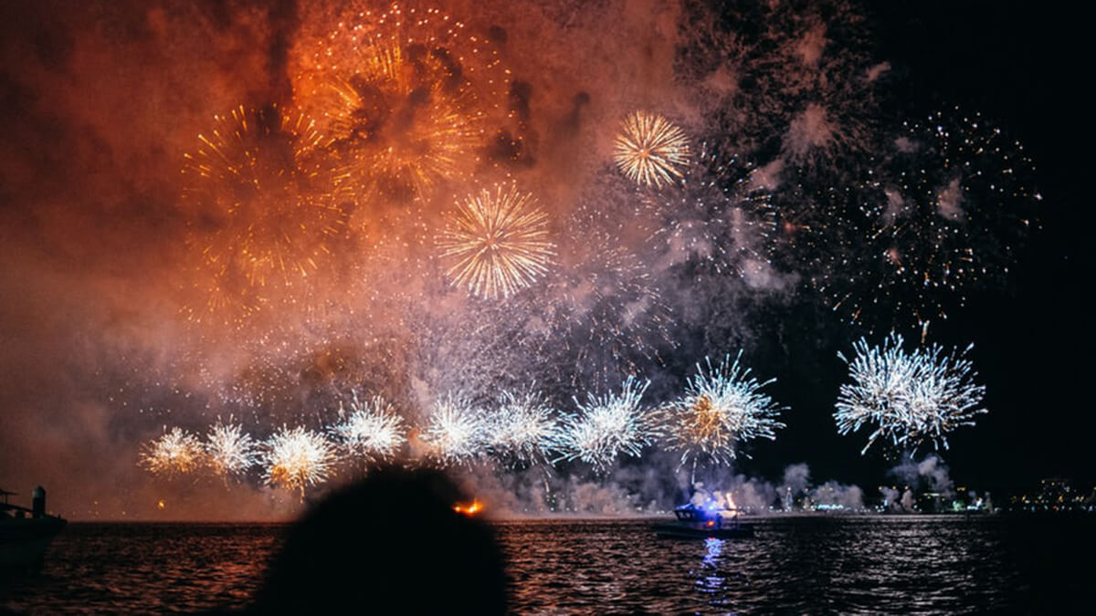 fireworks over river